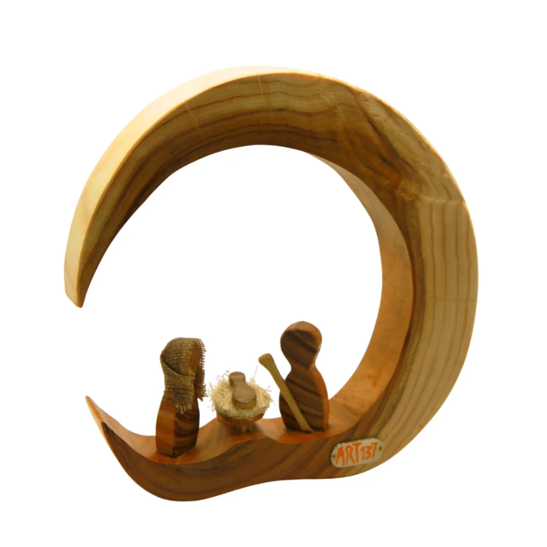 acacia wood half-moon crib seen from the side showing the curvature of the piece