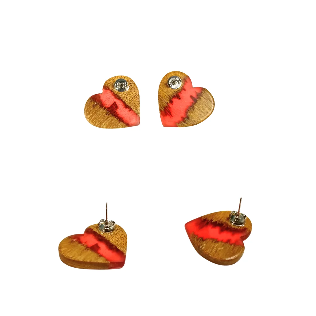 Front and back of heart earrings in natural wood and coral resin